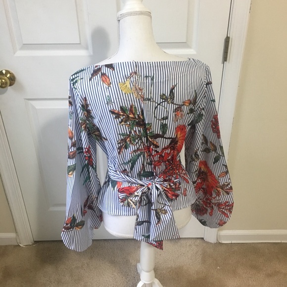 Exaggerated lantern sleeve belted mix print. - Picture 2 of 3